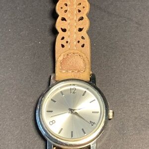 3/$20 ladies watch with cutout leather band